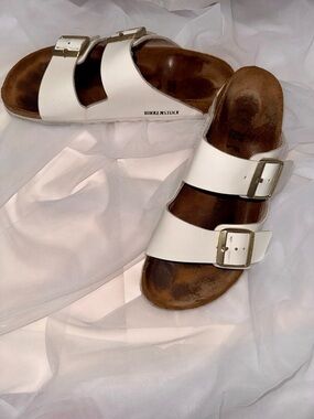 Birkenstock Patent White Two-Strap Arizona Sandals with Gold Buckles 39